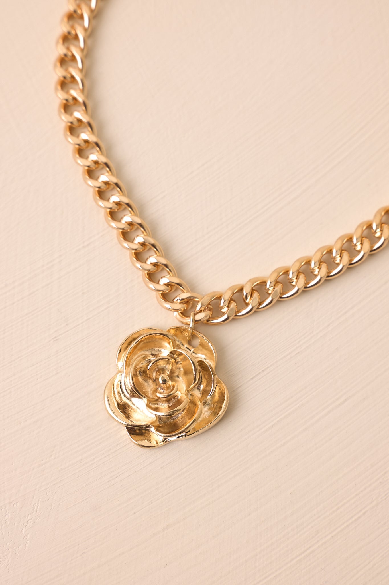 Breaking Through Gold Flower Pendant Necklace